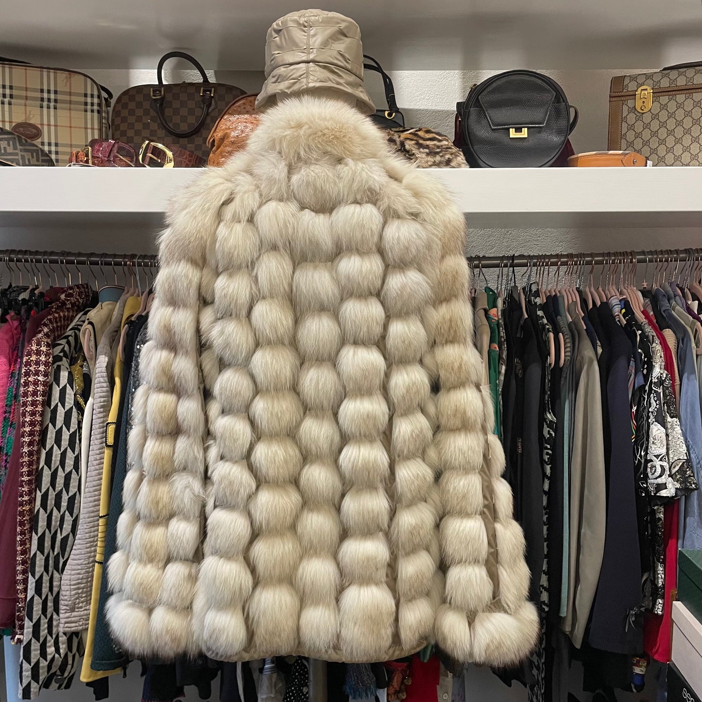 Piumino reversibile con pelliccia