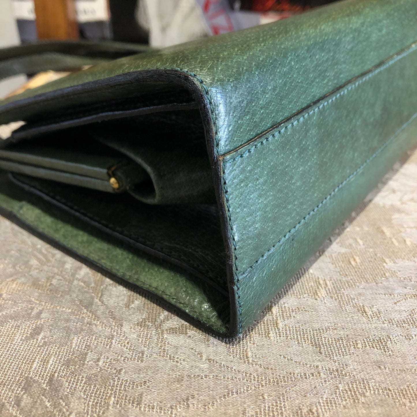 borsa GUCCI vintage degli anni '60 nell'iconica pelle verde del brand