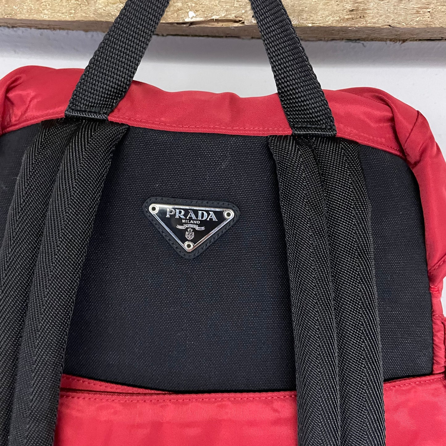 Zaino Prada nylon rosso con marsupio staccabile logo triangolo 